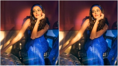 With the help of fashion stylist Mohit Rai, Ananya accessorised her look with a pair of dazzling silver rectangular earrings, a matching blue headband and a pair of blue shimmery Jimmy Choo pump heels. (Instagram/@ananyapanday) With the help of fashion stylist Mohit Rai, Ananya accessorised her look with a pair of dazzling silver rectangular earrings, a matching blue headband and a pair of blue shimmery Jimmy Choo pump heels. (Instagram/@ananyapanday)