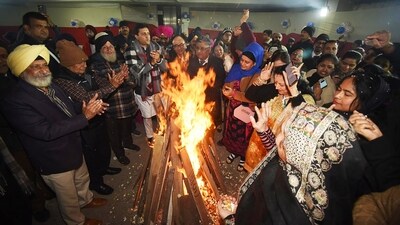 The Sikh community in Patna rejoices in the festivities of the Lohri festival on Saturday. (ANI)