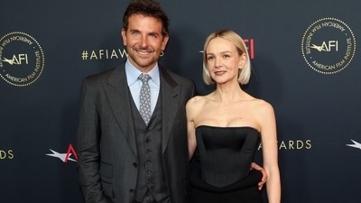 Maestro stars Bradley Cooper and Carey Mulligan posed together on the red carpet at the AFI (American Film Institute) Awards Luncheon. They were twinning in black.&nbsp; (REUTERS)
