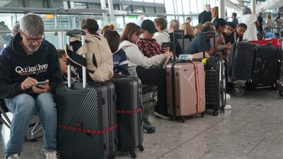 Passengers are seen waiting for delayed flights in London's Heathrow airport. (AP) Passengers are seen waiting for delayed flights in London's Heathrow airport. (AP)