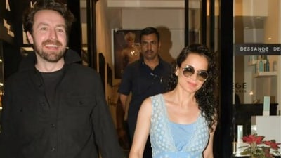 Kangana Ranaut with a man in Mumbai. Kangana Ranaut with a man in Mumbai.