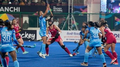 Ranchi: Monika (C) of India (in Blue) tries to score a goal during the FIH Hockey Olympic Qualifiers match between India and United States, at Marang Gomke Jaipal Singh Astro Turf Hockey Stadium (PTI) Ranchi: Monika (C) of India (in Blue) tries to score a goal during the FIH Hockey Olympic Qualifiers match between India and United States, at Marang Gomke Jaipal Singh Astro Turf Hockey Stadium (PTI)