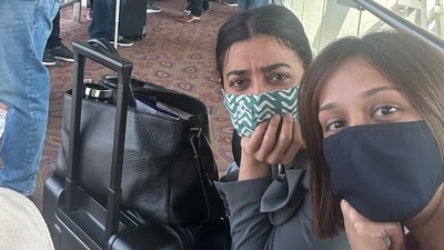 Radhika Apte with a friend at the airport.