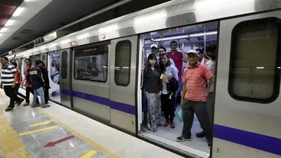 People are seen moving in and out of a Delhi metro train. (HT File) People are seen moving in and out of a Delhi metro train. (HT File)