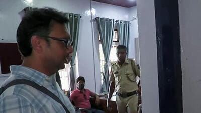 Venkat Raman, husband of Bengaluru-based CEO Suchna Seth, who is accused of killing her four-year-old son, arrives at Calangute police station in Goa along with his lawyer, in North Goa on Saturday (ANI)