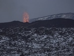 Lava spews from the site of a volcanic eruption north of Grindavik, Iceland, Flights in and out of Iceland to continue despite volcanic eruption, lava spread in near town 