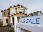 FILE - A "for sale" sign is posted in front of a home in Sacramento, Calif., March 3, 2022. The recent pullback in mortgage rates is spurring more homeowners to put their homes up for sale, though the increases so far have been too modest to return the housing market’s inventory of available properties back to even pre-pandemic levels.