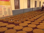 The laddoos are made using pure desi ghee, blending besan with cardamom, cashews, and saffron. The laddoos are made using pure desi ghee, blending besan with cardamom, cashews, and saffron.