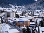 The Davos Congress Center, center, where the World Economic Forum will take place is covered in snow in Davos, Switzerland