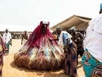 Voodoo followers attend the voodoo festival in Ouidah, Benin on January 10, 2023. 