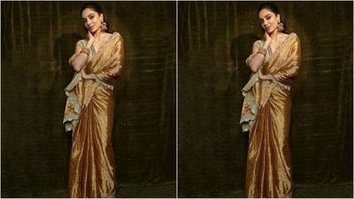 Sobhita's mesmerising saree, sourced from Monika and Karishma's clothing brand Jade, has an opulent gold zari all over for added glamour. She draped it beautifully around her, letting the pallu fall elegantly from her shoulders. (Instagram/@sobhitad) Sobhita's mesmerising saree, sourced from Monika and Karishma's clothing brand Jade, has an opulent gold zari all over for added glamour. She draped it beautifully around her, letting the pallu fall elegantly from her shoulders. (Instagram/@sobhitad)