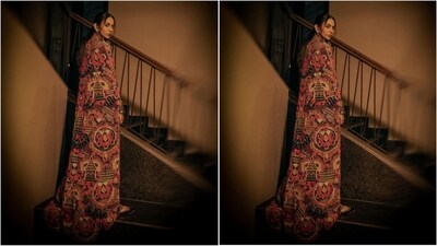 Paired with a black slit skirt that accentuated the drape pattern and a matching long cape with full sleeves that reached down to the floor, she added royal vibes to her look. With a perfect blend of colours and fabrics, her outfit is a complete showstopper. (Instagram/@rakulpreet)