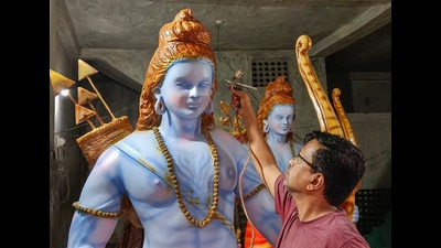 An artist gives final touches to a Lord Ram statue at Sant Shree Namdeo Maharaj Math, ahead of the Jan. 22's consecration of the Ayodhya Ram Mandir, in Nagpur, Sunday. (PTI) An artist gives final touches to a Lord Ram statue at Sant Shree Namdeo Maharaj Math, ahead of the Jan. 22's consecration of the Ayodhya Ram Mandir, in Nagpur, Sunday. (PTI)