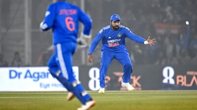 India's captain Rohit Sharma (R) fields the ball during the first Twenty20 international cricket match between India and Afghanistan at the Punjab Cricket Association Stadium in Mohali (AFP) India's captain Rohit Sharma (R) fields the ball during the first Twenty20 international cricket match between India and Afghanistan at the Punjab Cricket Association Stadium in Mohali (AFP)
