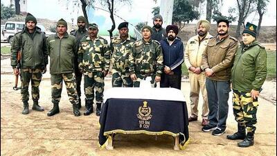 Continuing the Special Drive against trans-border smuggling networks, Tarn Taran Police & #BSF, in a joint Search operation have recovered 672 gram Heroin during search in fields of Dall village. (HT Photo)