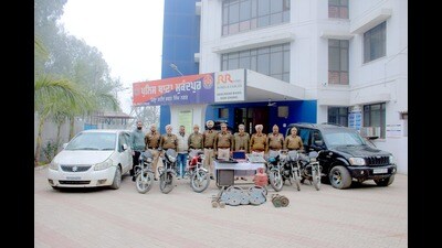 Five stolen cars, six motorcycles, gold ornaments and heroin has been recovered from the accused. (HT Photo)
