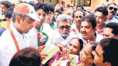 Milind Deora, Congress MP and party candidate from Mumbai South, at an election campaign in Mumbai. PTI Photo Milind Deora, Congress MP and party candidate from Mumbai South, at an election campaign in Mumbai. PTI Photo