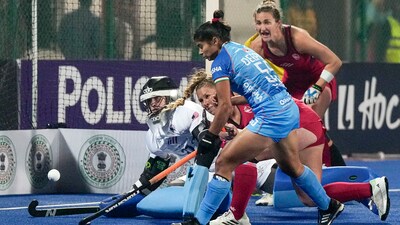 Ranchi: United States goalkeeper Kelsey Bing(31) saves an attempt of India's Deepika (55) during the FIH Hockey Olympic Qualifiers (PTI) Ranchi: United States goalkeeper Kelsey Bing(31) saves an attempt of India's Deepika (55) during the FIH Hockey Olympic Qualifiers (PTI)