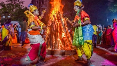 Artists perform during the celebration of Bhogi, the first day of the four-day festival of Pongal, in Hyderabad. (PTI Photo) Artists perform during the celebration of Bhogi, the first day of the four-day festival of Pongal, in Hyderabad. (PTI Photo)