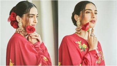 Sonam accessorised the ensemble with embroidered juttis, kundan-adorned gold rings, rose-adorned hair ornaments, and beauteous chandbalis. Lastly, a centre-parted braided bun, darkened brows, a bindi, berry lip shade, rouge on the cheekbones, smudged eye shadow, mascara on the lashes, and highlighter completed the glam picks. (Instagram) Sonam accessorised the ensemble with embroidered juttis, kundan-adorned gold rings, rose-adorned hair ornaments, and beauteous chandbalis. Lastly, a centre-parted braided bun, darkened brows, a bindi, berry lip shade, rouge on the cheekbones, smudged eye shadow, mascara on the lashes, and highlighter completed the glam picks. (Instagram)