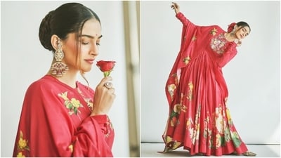 The anarkali has a round neckline, full-length sleeves, cinched detail under the bust, a flowy skirt with a pleated design, and a layered ghera. The actor wore it with red pants and a matching print dupatta draped on her shoulder in a floor-sweeping length. (Instagram) The anarkali has a round neckline, full-length sleeves, cinched detail under the bust, a flowy skirt with a pleated design, and a layered ghera. The actor wore it with red pants and a matching print dupatta draped on her shoulder in a floor-sweeping length. (Instagram)