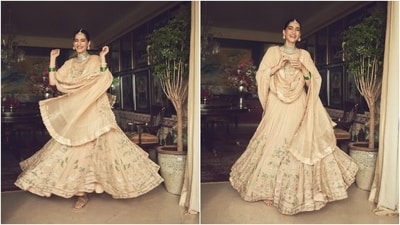 While Sonam's choli has a round neckline, half-length sleeves, and a fitted bust, the skirt has flowy layered ghera and dori ties. Lastly, the actor draped the dupatta on her shoulders to complete the traditional look. Kolhapuri sandals and gold and emerald jewellery, including a choker necklace, bangles, bracelets, jhumkis, rings, and a mang tika completed the accessories. (Instagram) While Sonam's choli has a round neckline, half-length sleeves, and a fitted bust, the skirt has flowy layered ghera and dori ties. Lastly, the actor draped the dupatta on her shoulders to complete the traditional look. Kolhapuri sandals and gold and emerald jewellery, including a choker necklace, bangles, bracelets, jhumkis, rings, and a mang tika completed the accessories. (Instagram)