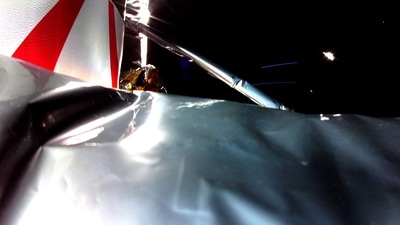 This handout image shows the first image from Astrobotic's Peregrine Lunar Lander in space showing Multi-Layer Insulation (MLI) in the foreground. (AFP) This handout image shows the first image from Astrobotic's Peregrine Lunar Lander in space showing Multi-Layer Insulation (MLI) in the foreground. (AFP)