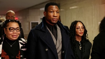 Actor Jonathan Majors arrived with Meagan Good for the jury selection in his  assault and harassment case at Manhattan Criminal Court in New York City on December 18, 2023. (REUTERS)