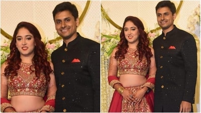 Ira Khan and Nupur Shikhare pose for the paparazzi at their wedding reception. (HT Photo/Varinder Chawla) Ira Khan and Nupur Shikhare pose for the paparazzi at their wedding reception. (HT Photo/Varinder Chawla)