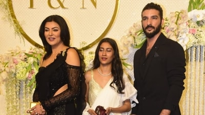 Sushmita Sen attended Ira Khan and Nupur Shikhare's wedding reception with daughter Renee and model friend Rohman Shawl. While Sushmita wore a black ruffled saree, Renee wore a white one. Sushmita Sen attended Ira Khan and Nupur Shikhare's wedding reception with daughter Renee and model friend Rohman Shawl. While Sushmita wore a black ruffled saree, Renee wore a white one. 