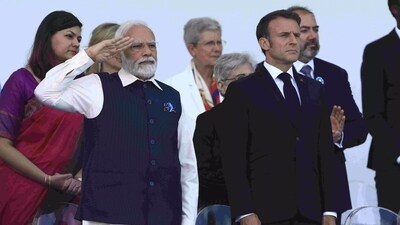 Prime Minister Narendra Modi saluting an Indian Tri-Service contingent at Bastille Day Parade on July 14, 2023. Prime Minister Narendra Modi saluting an Indian Tri-Service contingent at Bastille Day Parade on July 14, 2023.
