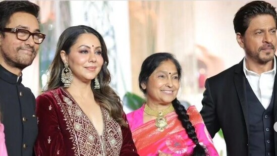 Aamir Khan, Gauri Khan and Shah Rukh Khan at Ira Khan's wedding reception.