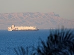 FILE PHOTO: Container ships sail across the Gulf of Suez towards the Red Sea before entering the Suez Canal, in El Ain El Sokhna in Suez, east of Cairo, Egypt, March 17, 2018. 
