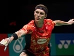 Denmark's Viktor Axelsen returns a shot