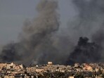 Smoke billowing over Khan Yunis in the southern Gaza Strip during Israeli bombardment, amid ongoing battles between Israel and the Palestinian militant group Hamas. (AFP)