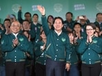 Taiwanese Vice President Lai Ching-te, also known as William Lai, center, celebrates his victory with running mate Bi-khim Hsiao, right, and supporters in Taipei, Taiwan.