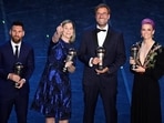 Lionel Messi poses after winning the Best FIFA Men's player award with the winner of the Best FIFA Men's coach award Liverpool manager Juergen Klopp, winner of the Best FIFA Women's player award USA's Megan Rapinoe Lionel Messi poses after winning the Best FIFA Men's player award with the winner of the Best FIFA Men's coach award Liverpool manager Juergen Klopp, winner of the Best FIFA Women's player award USA's Megan Rapinoe
