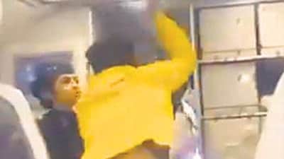 A still from the video in which Sahil Kataria (in yellow) strikes the co-pilot. (HT) A still from the video in which Sahil Kataria (in yellow) strikes the co-pilot. (HT)