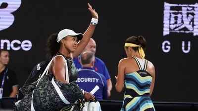 Naomi Osaka of Japan waves as she leaves Rod Laver Arena following her first round loss to Caroline Garcia (AP) Naomi Osaka of Japan waves as she leaves Rod Laver Arena following her first round loss to Caroline Garcia (AP)