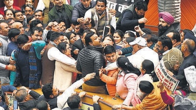 BJP members shout slogans as the AAP passes two private member’s resolutions during the special session on Monday. (Sanjeev Verma/HT Photo) BJP members shout slogans as the AAP passes two private member’s resolutions during the special session on Monday. (Sanjeev Verma/HT Photo)