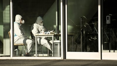 Covid In China: Security guards wearing personal protective equipment (PPE) (AFP)
