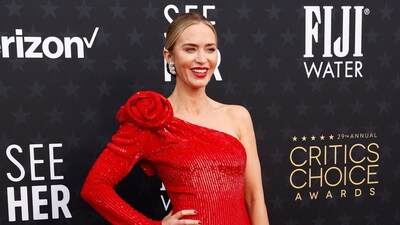 US-British actress Emily Blunt arrives for ceremony in another red rose inspired dress. She was nominated in Best Supporting Actress category for Oppenheimer. She lost to Da’Vine Joy Randolph for The Holdovers. (AFP)