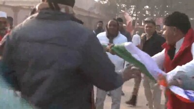 As the ruckus grew, police officials were seen breaking the tension and dispersing the public. (ANI/Screengrab)