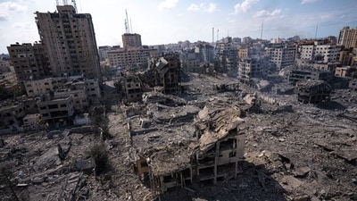 Israel-Hamas war: A view of the rubble of buildings hit by an Israeli airstrike in Gaza City. (AP) Israel-Hamas war: A view of the rubble of buildings hit by an Israeli airstrike in Gaza City. (AP)