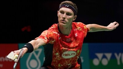 Denmark's Viktor Axelsen returns a shot (AP) Denmark's Viktor Axelsen returns a shot (AP)