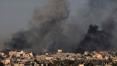 Smoke billowing over Khan Yunis in the southern Gaza Strip during Israeli bombardment, amid ongoing battles between Israel and the Palestinian militant group Hamas. (AFP) Smoke billowing over Khan Yunis in the southern Gaza Strip during Israeli bombardment, amid ongoing battles between Israel and the Palestinian militant group Hamas. (AFP)