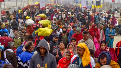 Rajendra Mishra, a priest, said devotees had started coming to the Sangam since late last night. (PTI) Rajendra Mishra, a priest, said devotees had started coming to the Sangam since late last night. (PTI)