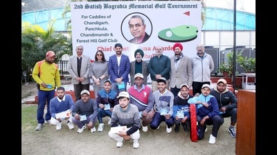 Winners of the second Satish Bagrodia Memorial Golf Tournament organised for caddies at the Chandigarh Golf Club greens on Monday. (HT Photo)