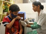 A health worker administering anti-Covid vaccine to a boy during a special vaccination camp for children at the Chandigarh Press Club. A health worker administering anti-Covid vaccine to a boy during a special vaccination camp for children at the Chandigarh Press Club.