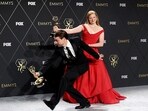 Sarah Snook and Kieran Culkin pose together with the Lead Actress in a Drama Series award and the Lead Actor in a Drama Series award for Succession. 